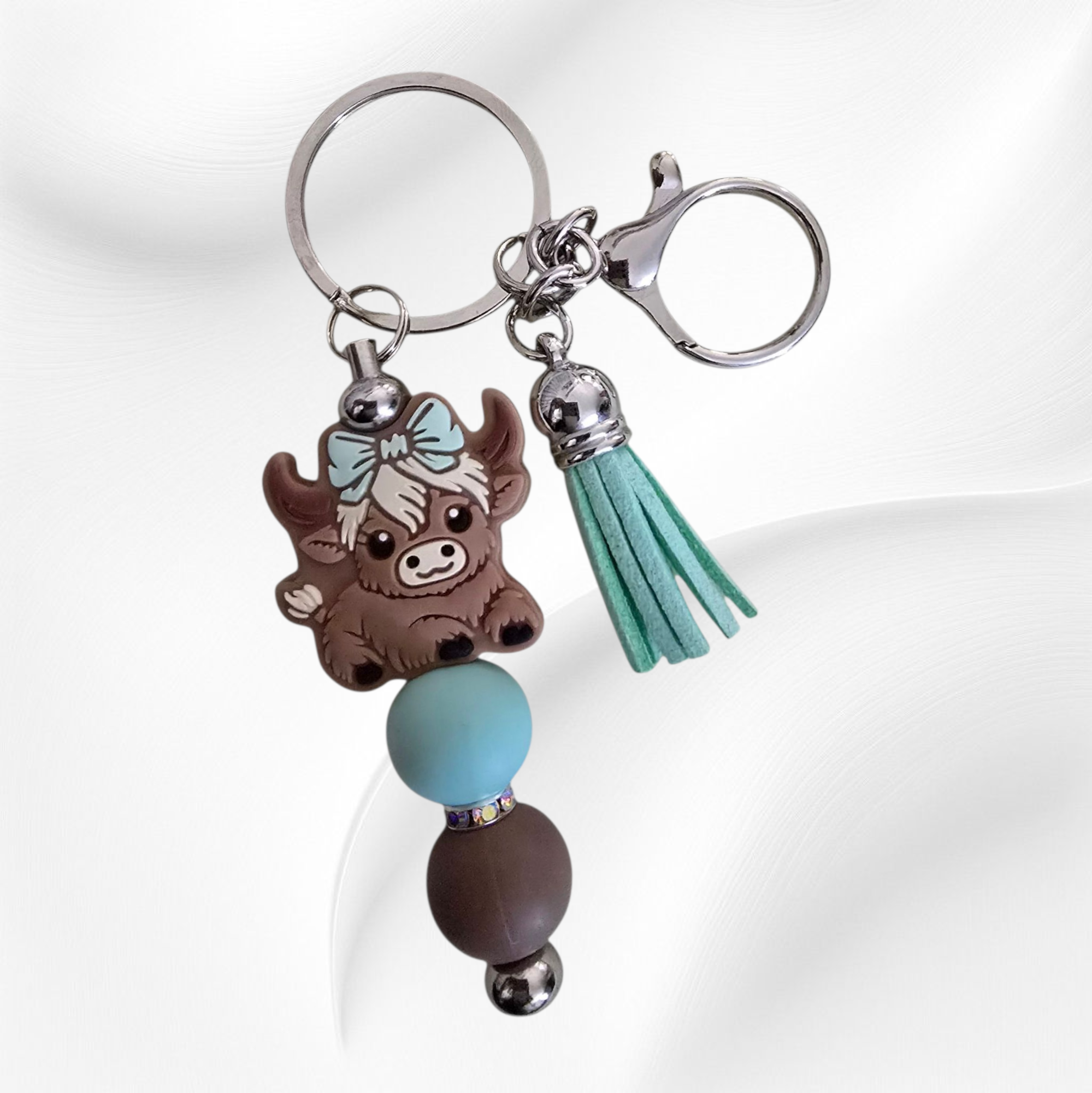 Hyland Blue Bow Cow Keychain